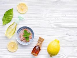 Salt, honey, and lemon on a shabby white background photo