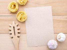 Pasta and garlic with kraft paper mock-up photo