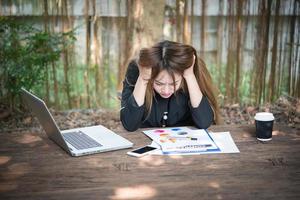 Portrait of a stressed out business woman at her workplace photo