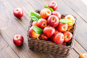 Red apples in basket photo
