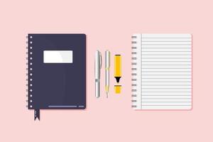 cuaderno personal con bolígrafos de colores