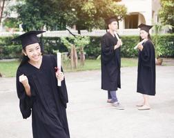 Portrait of diverse international graduating students celebrating success photo