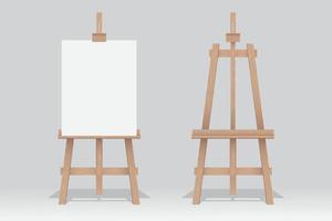 Wooden easels, one stands with blank canvas on white background