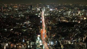 timelapse skyline van de stad Tokio met verkeer in japan 's nachts