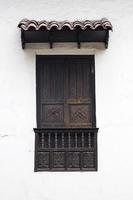 Traditional window from Cusco, Peru photo