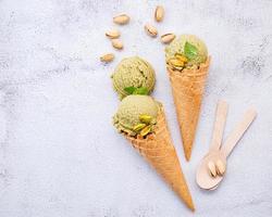 Pistachio ice cream in cones photo