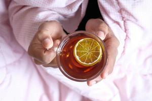 Mug of tea with lemon photo