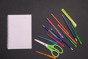 Back to school notebook and stationery background photo