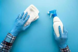Disinfecting spray bottle and rag photo