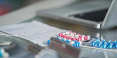 Stethoscope and medicine close-up photo