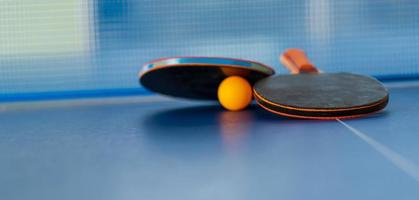 Table tennis racket and ball photo