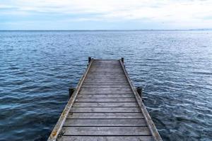 Wooden dock on the lake photo