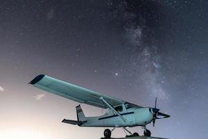 Plane with the Milky Way photo