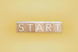 START word on wooden board with color background photo