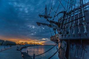 Galleon ship in the port photo