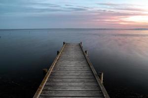 Wooden dock on the lake photo