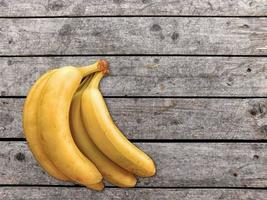 Bananas on a wood table background