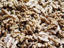 Pile of shelled walnuts photo