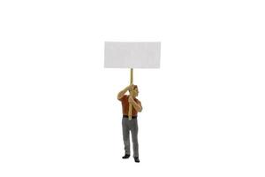Miniature people of protesters isolated on a white background photo