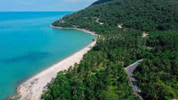 Aerial view of road and beach between in Thailand photo