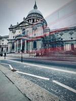 Blurred double decker near St. Paul's Cathedral photo