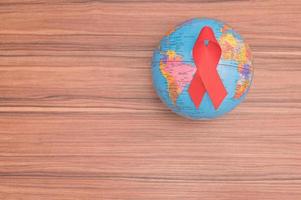 Red ribbon symbolizes World Health Day photo