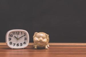 Clock and piggy bank photo