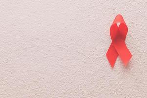 cinta roja simboliza el día mundial de la salud foto