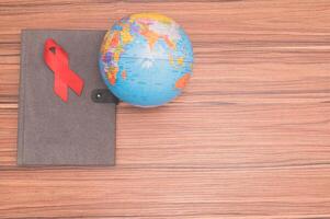 Red ribbon symbolizes World Health Day photo