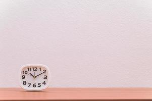 Clock on the table photo