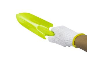 Green gardening tools on white background photo