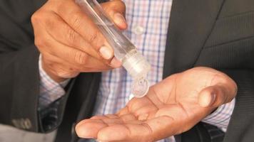 Close-Up on The Hands of A Businessman Using a Hand Sanitizer video