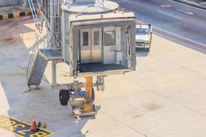 Airplane Bridge in airport for passengers photo