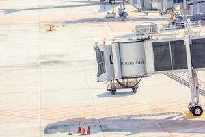 Airplane Bridge in airport for passengers photo