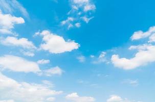 White clouds on blue sky photo