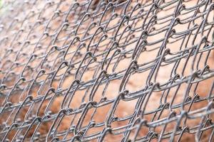 Close-up of wire fence photo