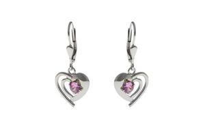 Silver earrings in the shape of heart photo