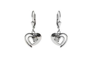 Silver earrings in the shape of heart photo