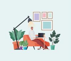 Man with laptop working on orange couch vector design