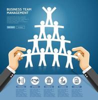 Business team management conceptual design. Hand holding a paper cut people team. Vector Illustrations.