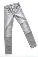 Gray jeans on white background photo