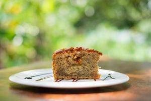 Homemade almond banana bread on a table photo