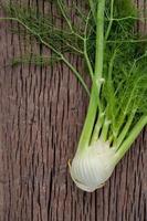 Fennel on a wooden background photo