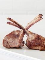 Roasted lamb chops on a white background photo