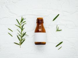 Bottle of rosemary oil photo