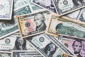 American dollars or US dollar banknotes background photo