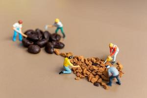 Miniature teams working together on coffee blending photo