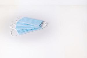 Surgical mask on white background photo