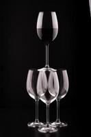 Wine glasses with black background photo