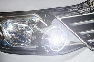 Bright car headlight photo